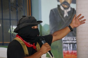 Subcommander Insurgent Moises makes a point during meeting with the Sixth Campaign and alternative media in La Realidad during Aug. 2014.