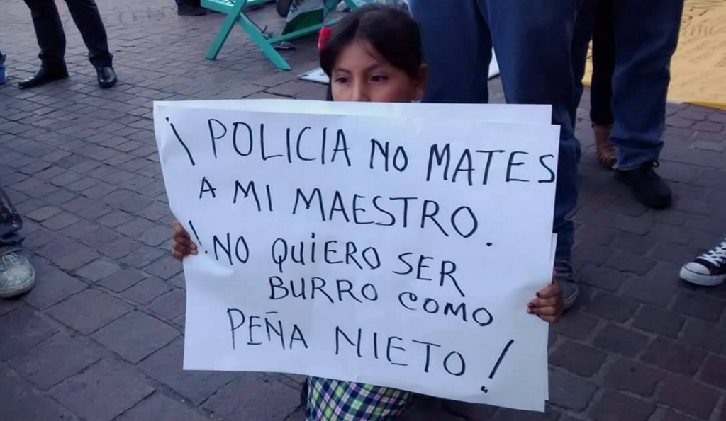 Policemen: Don't kill my teacher; I don't want to be [an uneducated] donkey like Pena Nieto.