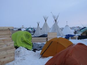 There are thousands of winterized structures for sleeping and many kitchens offering free food every day. This is the Two Spirits section of the camp organized by LGBT peoples.